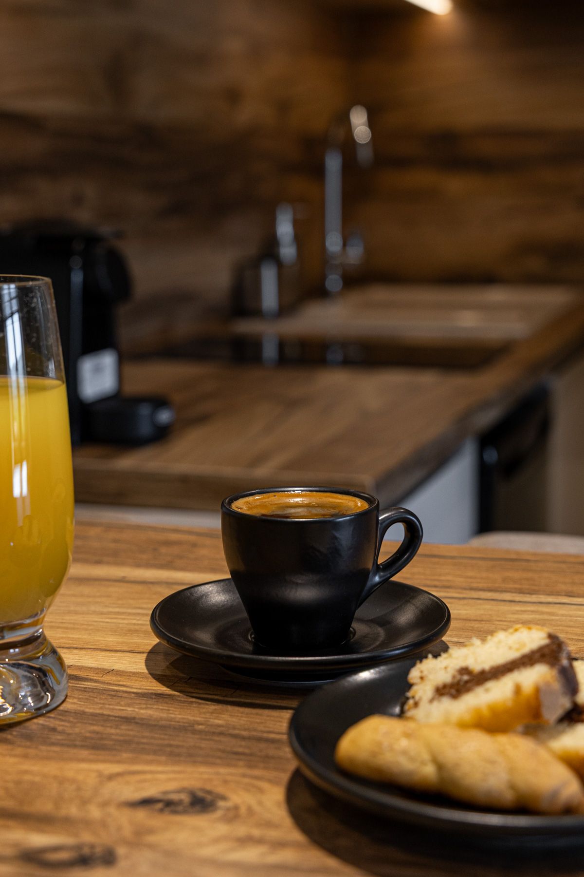 Coffee and pastries on Anemoessa's oak counter