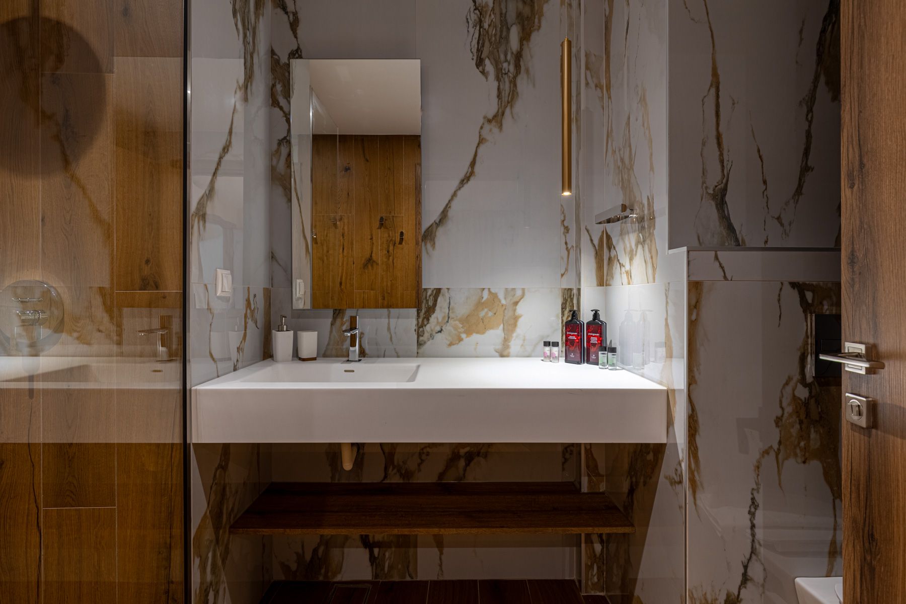 The basin and mirror in Anemoessa's marble bathroom
