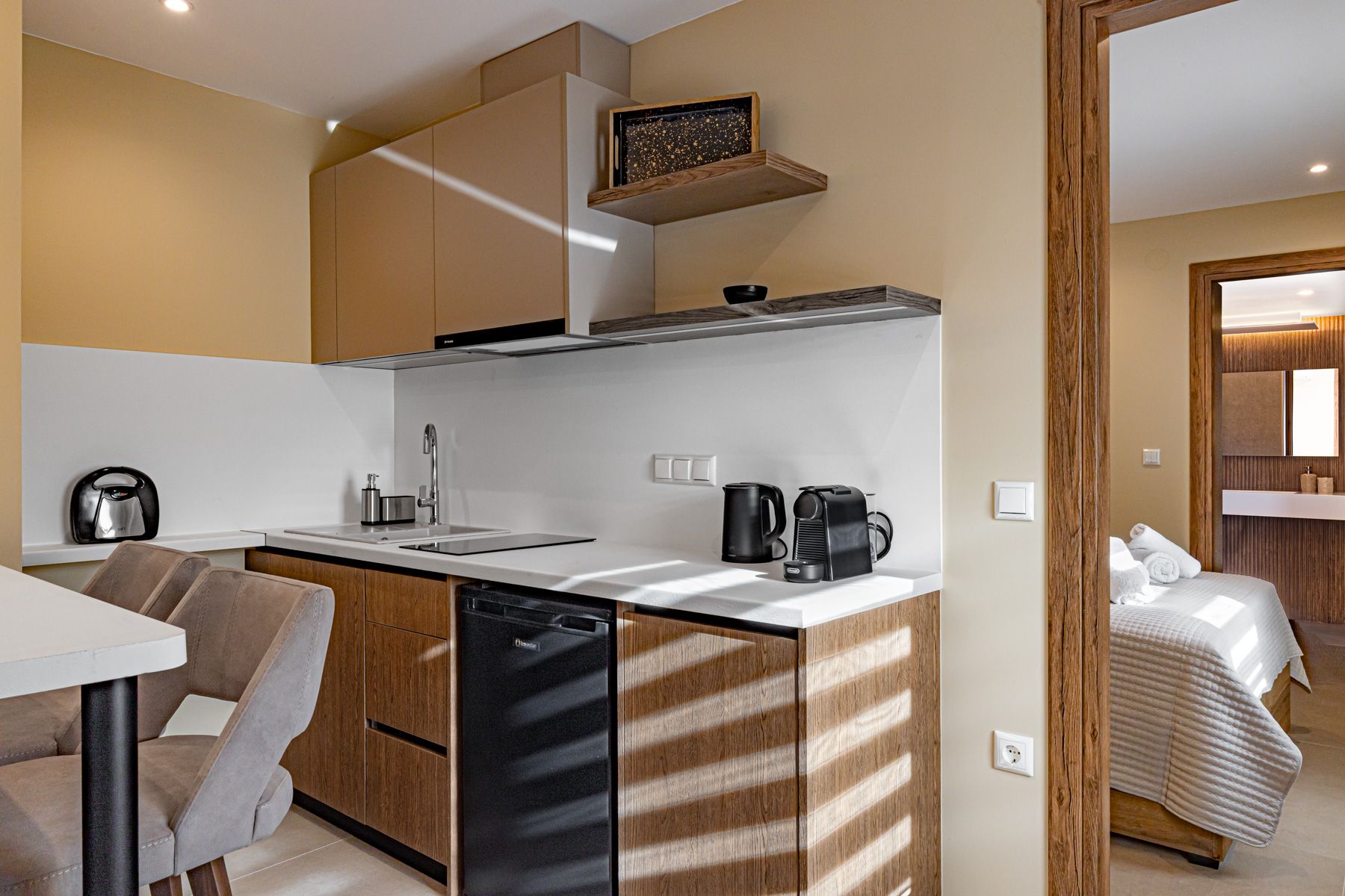 Asteroessa's kitchen counter, with the bedroom door beyond